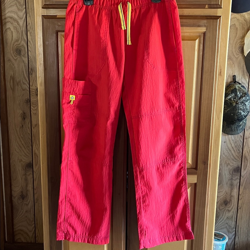 Spread good cheer red scrub pants. Size: small